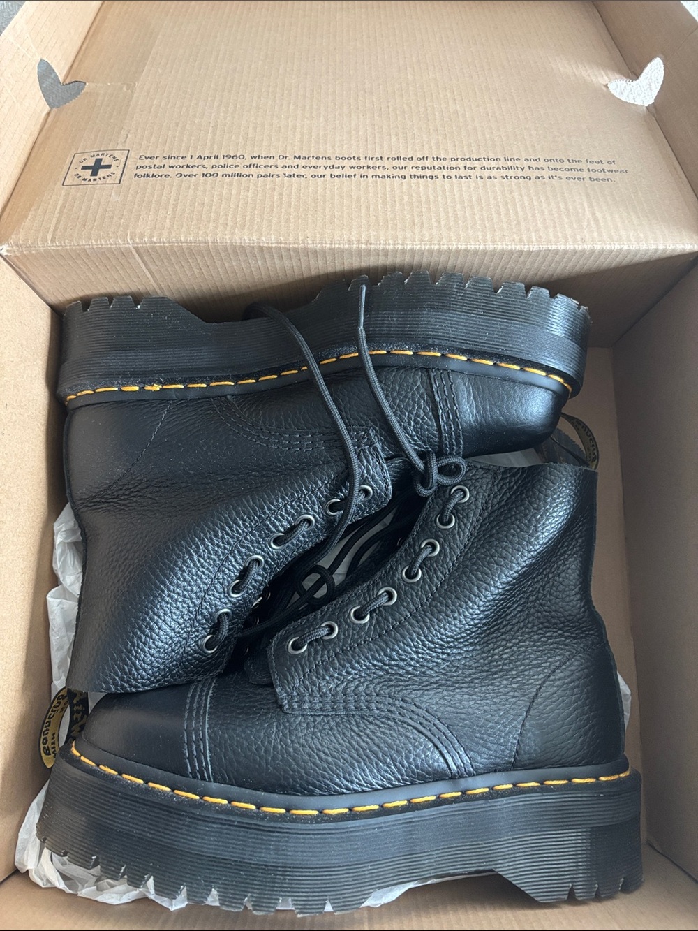 Dr. Martens Black Leather Lug-Sole Lace-Up Boots with Yellow Stitching